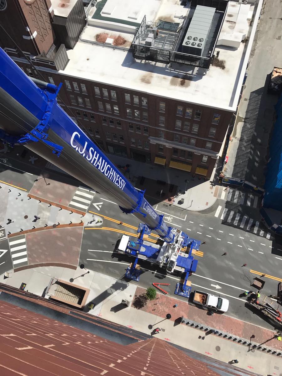 A CJ Shaughnessy crane boom on a job site